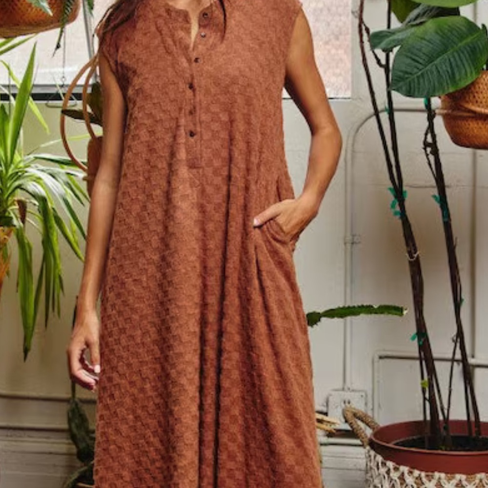 sleeveless brown jumpsuit